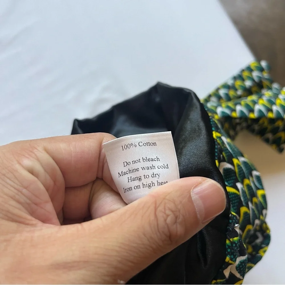 NWOT‎ EXCEPT MONDAYS black yellow green geo printed tie front mini skirt